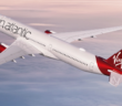A Virgin Atlantic plane flying through the sky