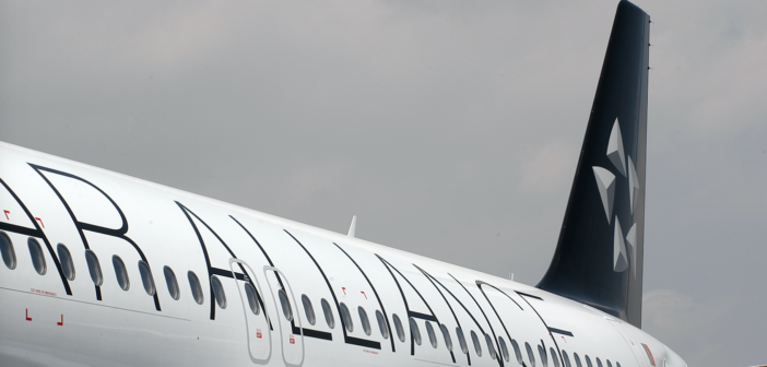 a plane with a Star Alliance livery