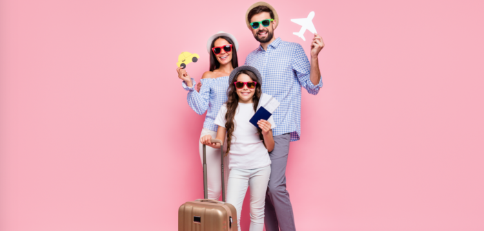 a happy family with a suitcase