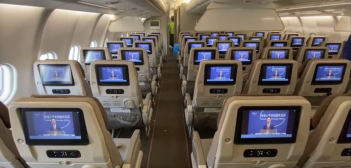 seatback entertainment screens in a china airlines plane, showing live news programmes