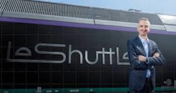 The Eurotunnel LeShuttle rebrand marks a new era in travel Yann Leriche, CEO of Getlink, parent company of Eurotunnel, next to a train with the the Eurotunnel LeShuttle rebranding