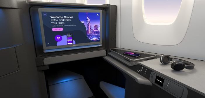 A large Panasonic Astrova IFE screen in a business class aircraft seat