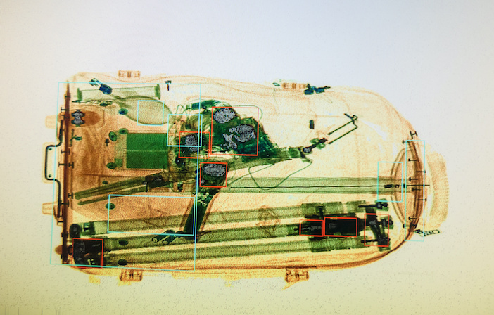 an X-ray image of a suitcase at the airport security screening