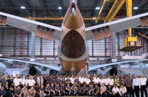 The Etihad Engineering team standing with the a380 in the hangar