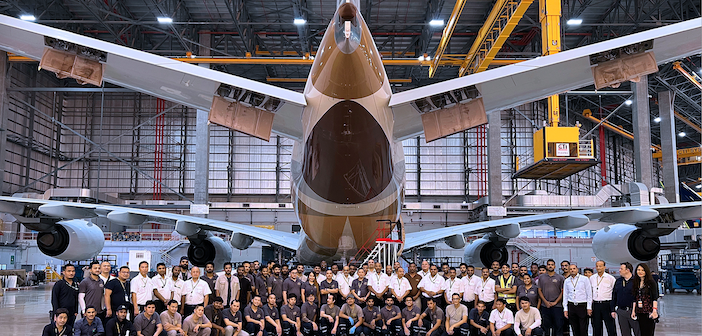 The Etihad Engineering team standing with the a380 in the hangar