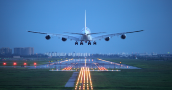 Aviation on track: continued buoyancy in aircraft orders and deliveries A four-engined airplane taking off at dusk
