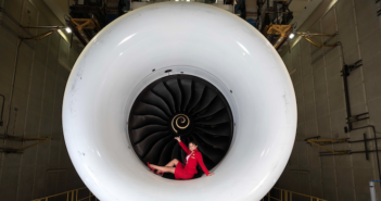 Virgin Atlantic sets a date for the world’s first 100% SAF flight across the pond A Virgin Atlantic crew member sitting in an engine cowling